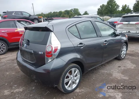 2014 Toyota Prius C Four from USA, damaged, VIN JTDKDTB39E1082897